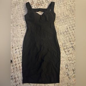 Black fitted LE Chateau midi dress. Size small
